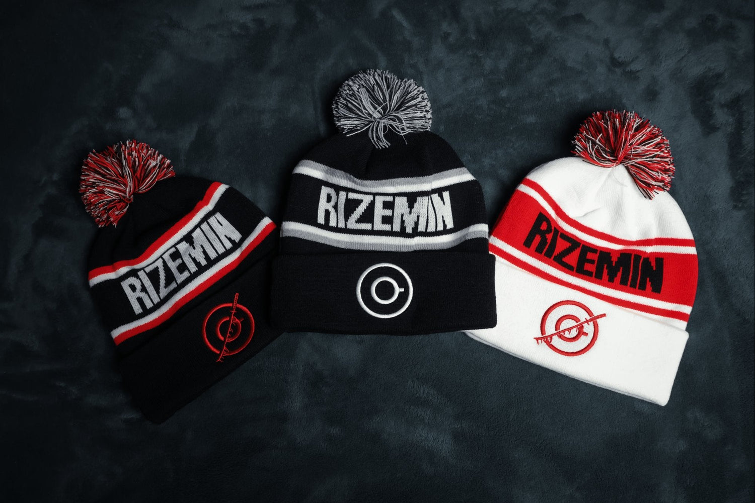 Three beanies with 'Rizemin' branding on a dark textured background